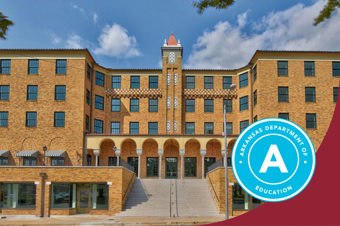 Exterior shot of the School for Advanced Studies Northwest Arkansas, with Arkansas Department of Education "A" badge